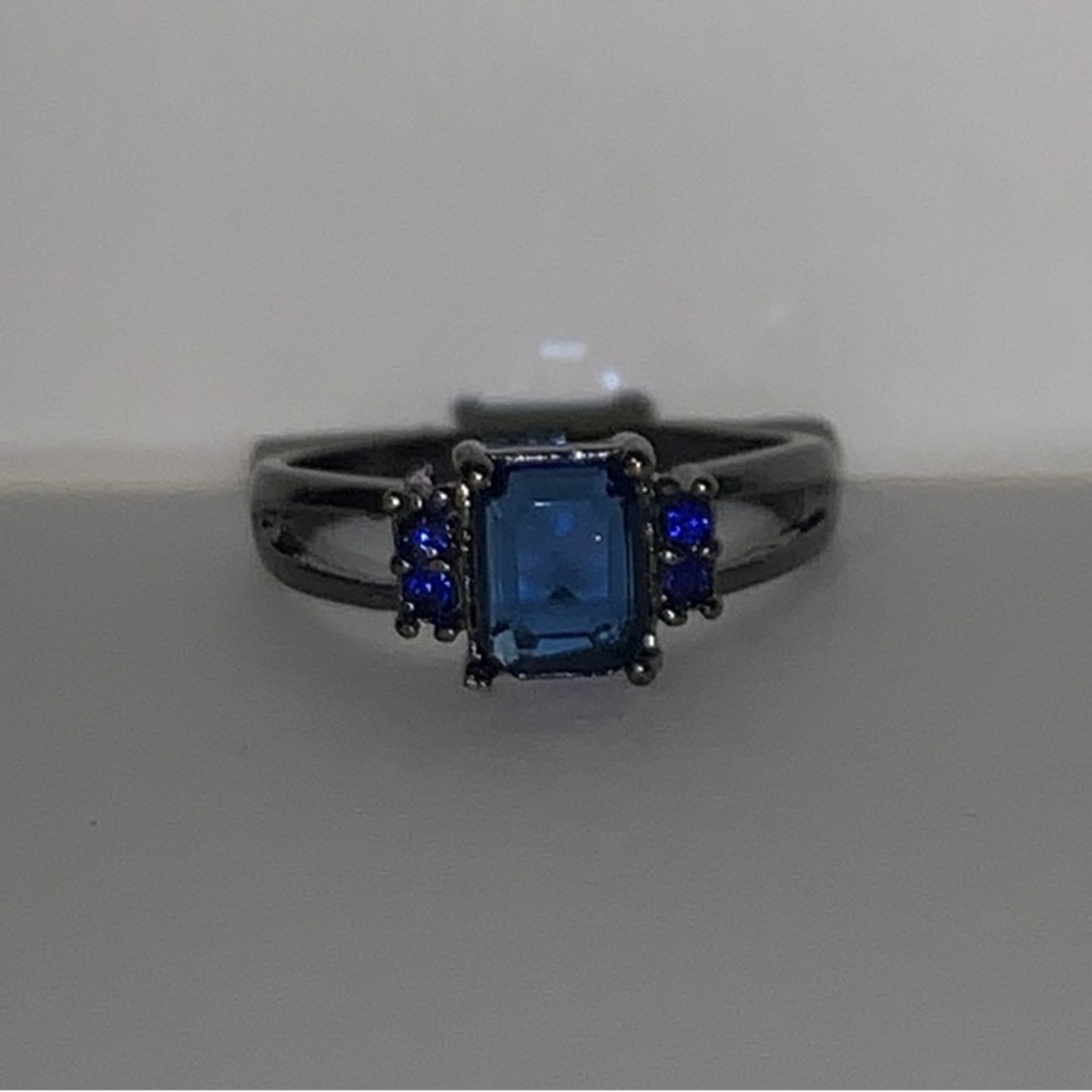 Elegant Blue Gemstone Ring with Gothic Dark Band